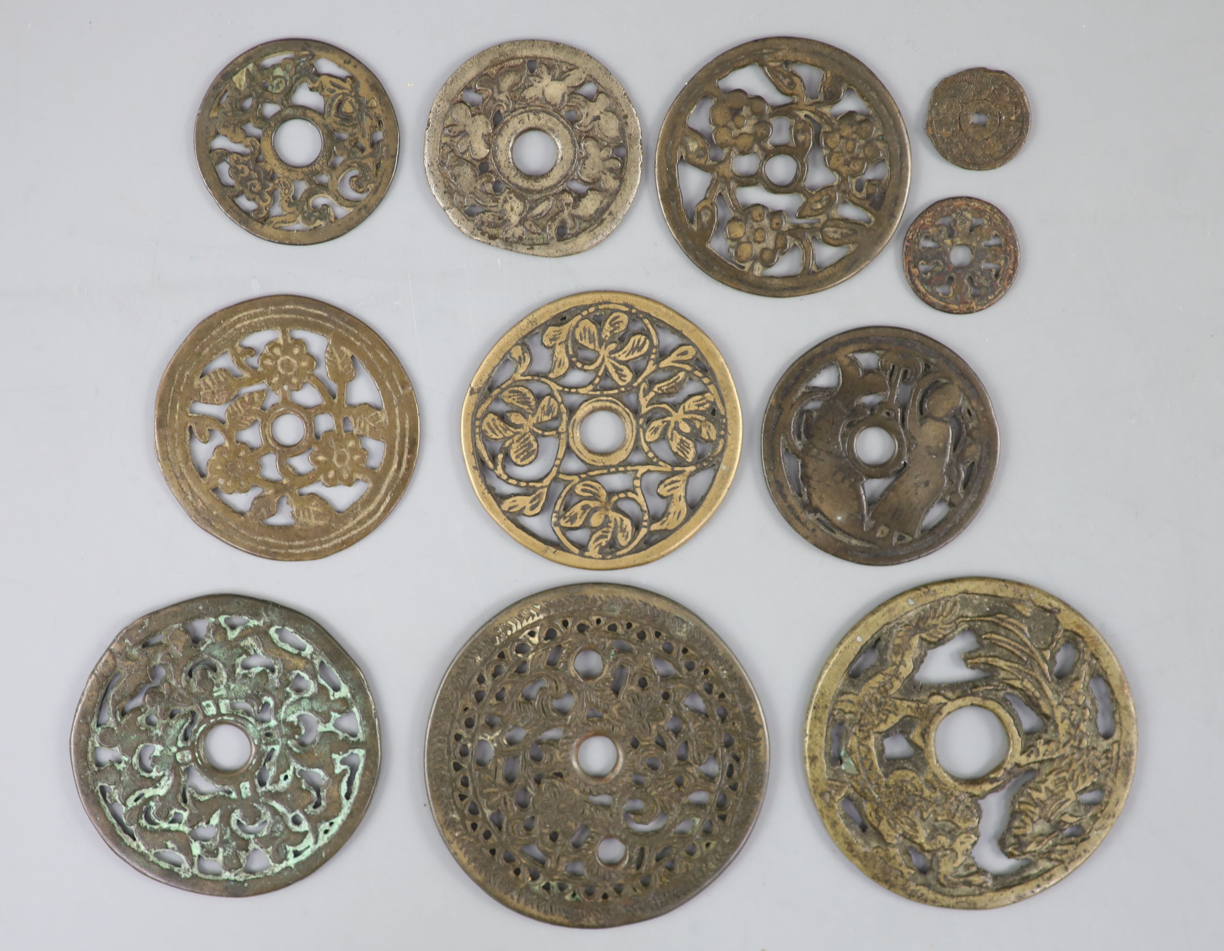 China, 10 bronze open work charms or amulets, Qing dynasty or earlier,